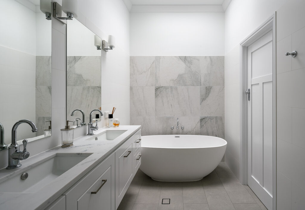 a beautiful renovated bathroom by Thirdson Construction